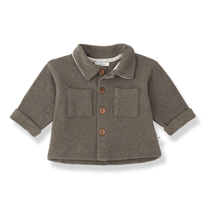 A toddler's long-sleeve button-up cardigan in a heathered taupe-brown fabric, featuring a pointed collar, two front patch pockets, and brown wooden buttons, shown on a plain white background.