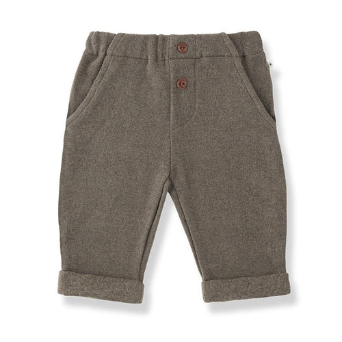 Pair of brown children's pants with buttons on a white background