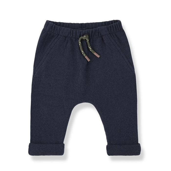 Navy blue baby pants with a drawstring on a white background