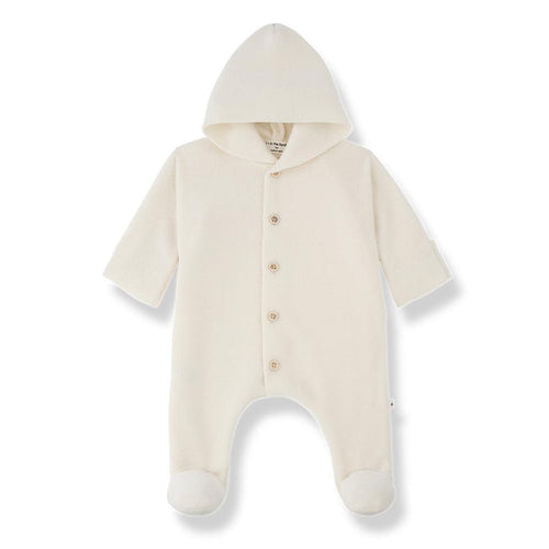 An off-white hooded baby footed romper with a snap-button front, photographed on a clean white background.