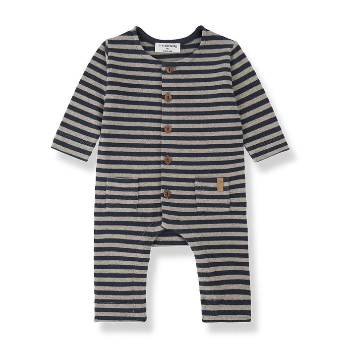 Striped baby romper with buttons on a white background