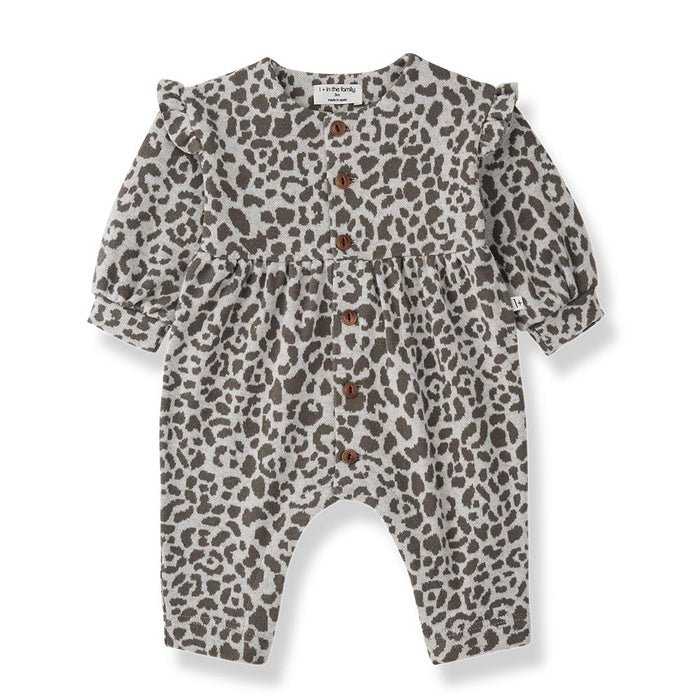 A baby long-sleeve romper in a brown and gray leopard print, featuring a button-up front and ruffled shoulders, shown on a plain white background.