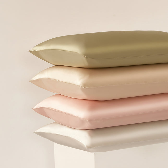 Four-color 22 Momme 100% 6A Mulberry Silk Pillowcases showing silk on both sides, with vibrant color and a smooth lustrous finish
