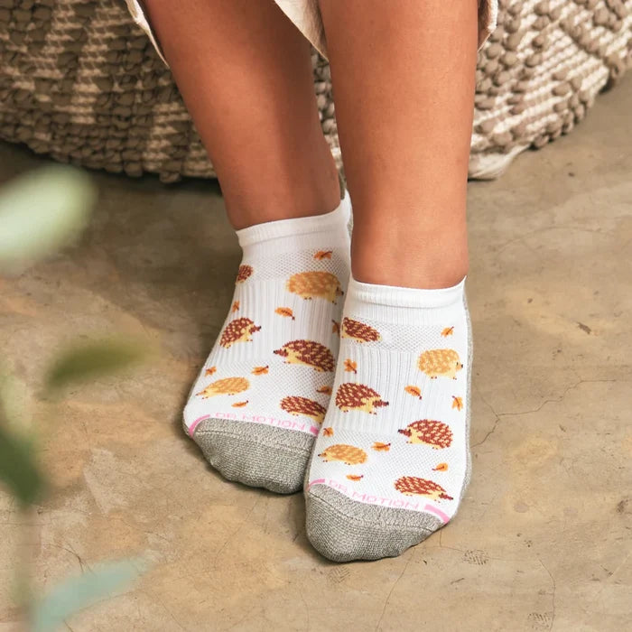 A woman wearing Ankle Compression Socks outside