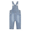 Light blue denim baby overalls with adjustable suspenders, front pockets, and silver metal snaps, shown flat against a solid white background.