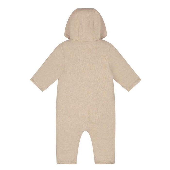 A light beige hooded long-sleeve baby romper shown from the back on a plain white background.