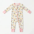 A baby long-sleeve footless zip-up sleeper with a butterfly and floral print, featuring pink cuffs and a pink zipper, laid flat on a white background.