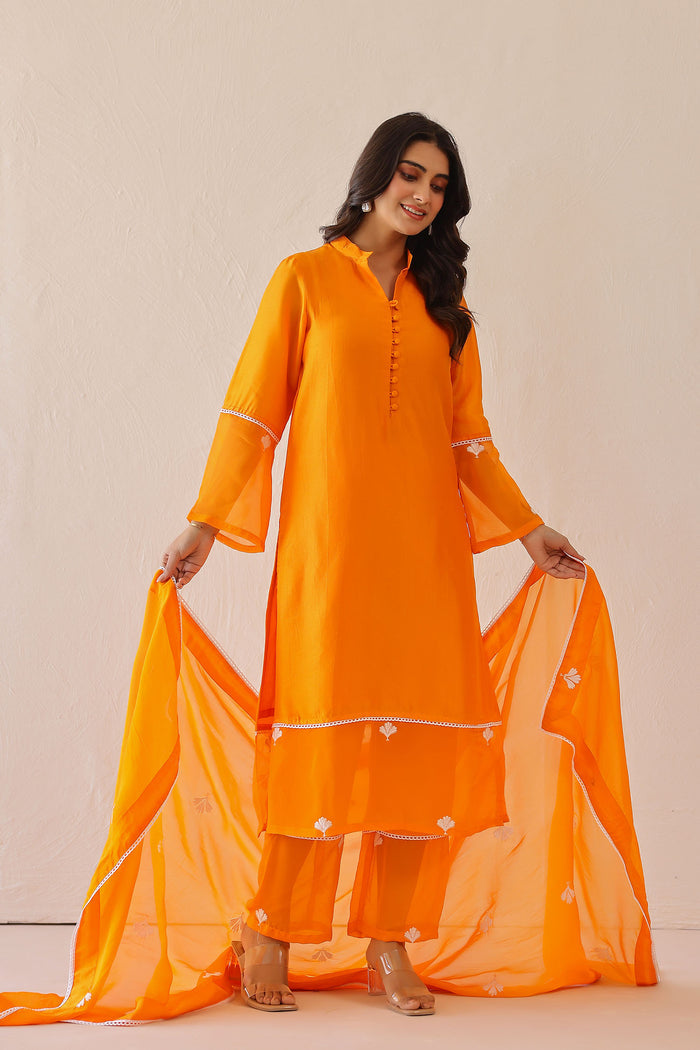 <img> Bright Orange Russian Silk Solid Kurti Set