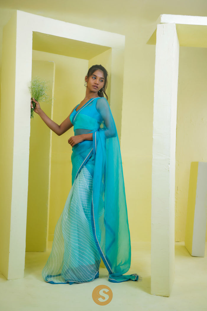 <img> Carolina Blue Printed Organza Saree With Leheriya Pattern