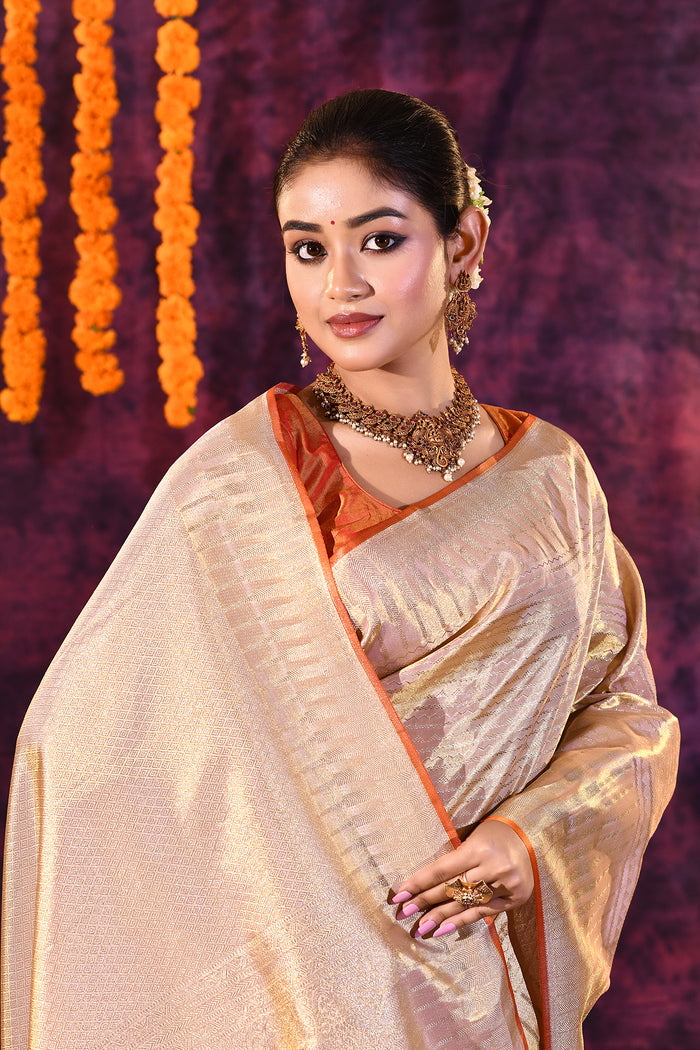 Champagne Gold With Striped Zari Weave Kanjivaram Tissue Saree