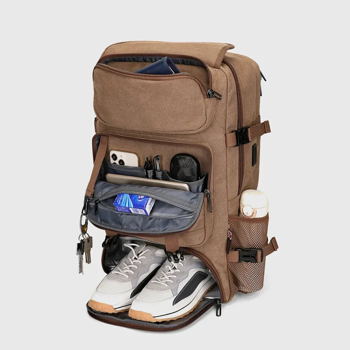 Brown carry-on backpack with separate shoe compartment and organized front storage pockets