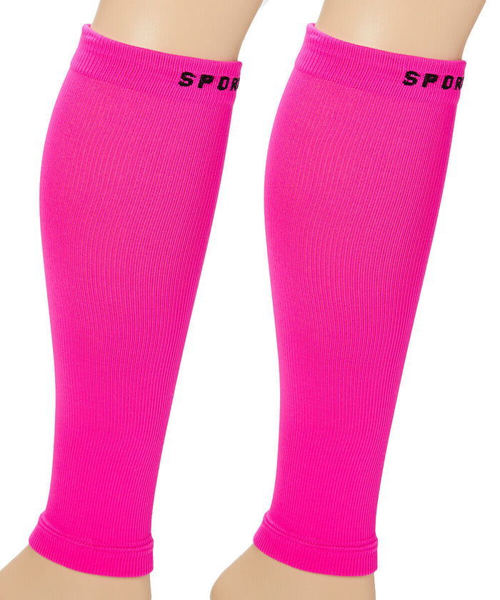 A pair of bright pink compression calf foot socks with 'SPORTX' written on the upper ankle area.