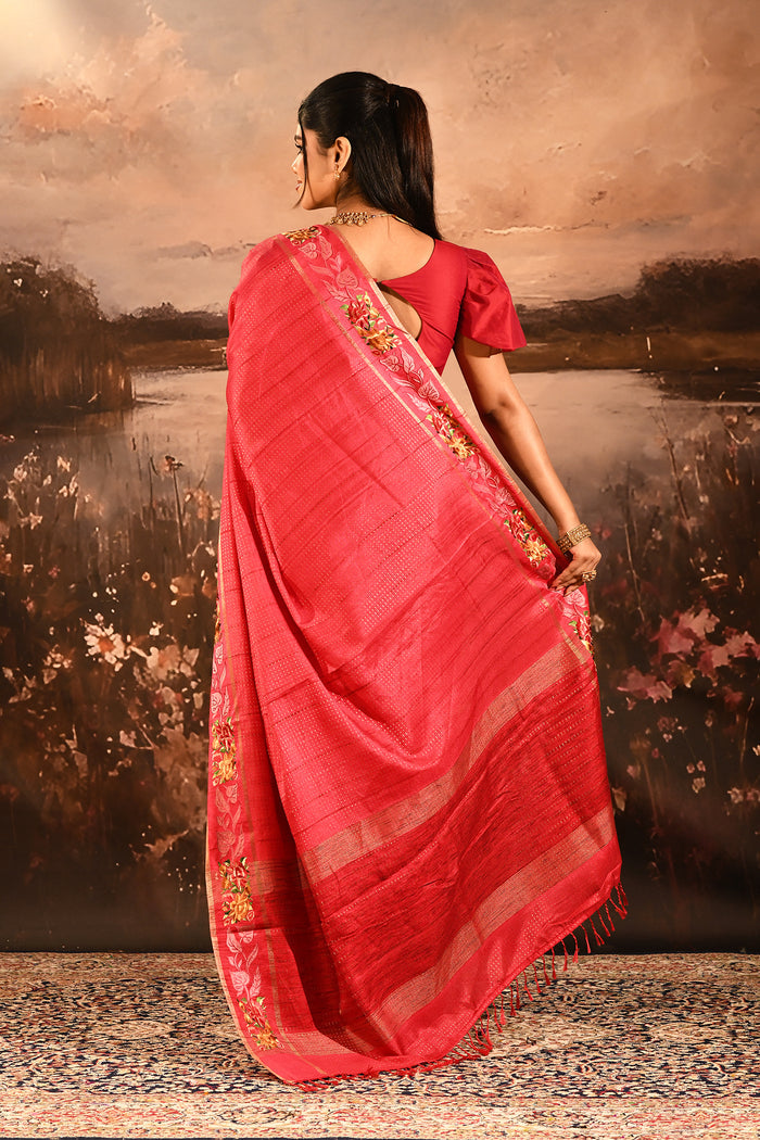 Coral Red Dotted Weave With Rose And Leaf Motif Border Designer Saree