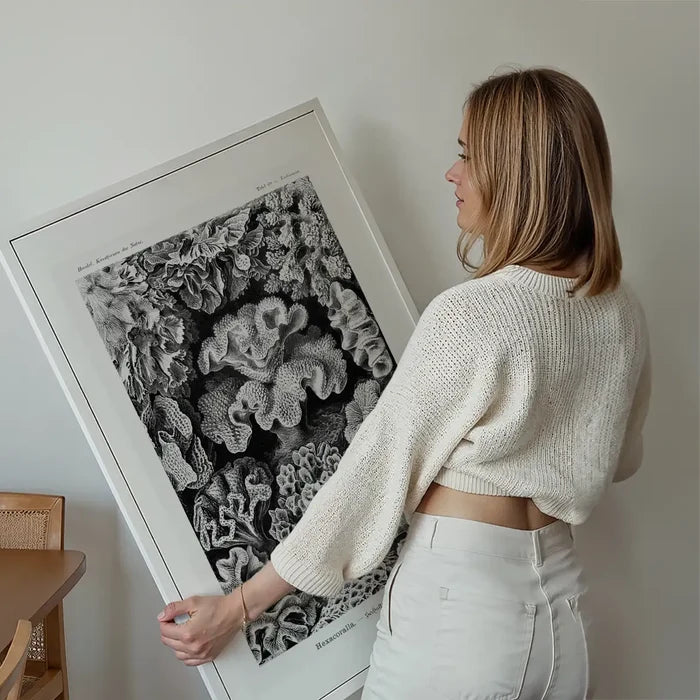 Corals Illustration Print held up against a living room wall
