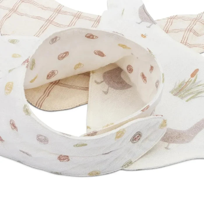 Baby bib with patterned design on a white background