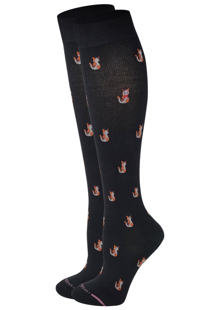Dr. Motion women’s knee-high compression socks with cute cat design providing 8–15 mmHg mild graduated support