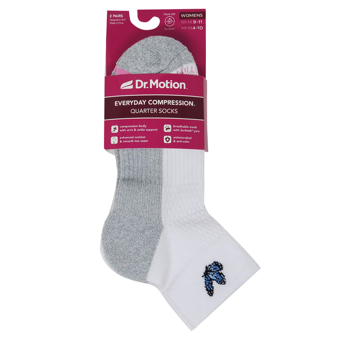 Two pairs of socks with packaging labeled 'Dr. Motion' on a white background