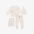 A baby clothing set laid out on a white background, including a long-sleeve wrap top, pants, a beanie, and a small pouch. The set is pale blush pink with a delicate light blue bunny print.