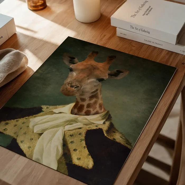Giraffe Portrait Print, quirky altered art print unframed on a home office desk