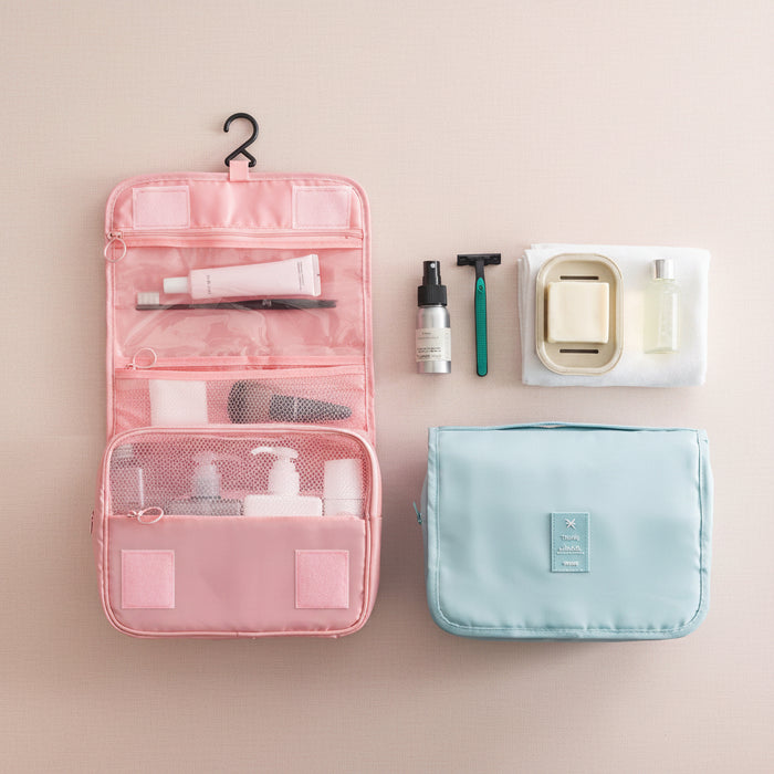 Hanging toiletry organizer with a hook, waterproof TPU pocket, breathable mesh pocket, main storage compartment and front zippered pocket for toiletries, skincare and makeup essentials