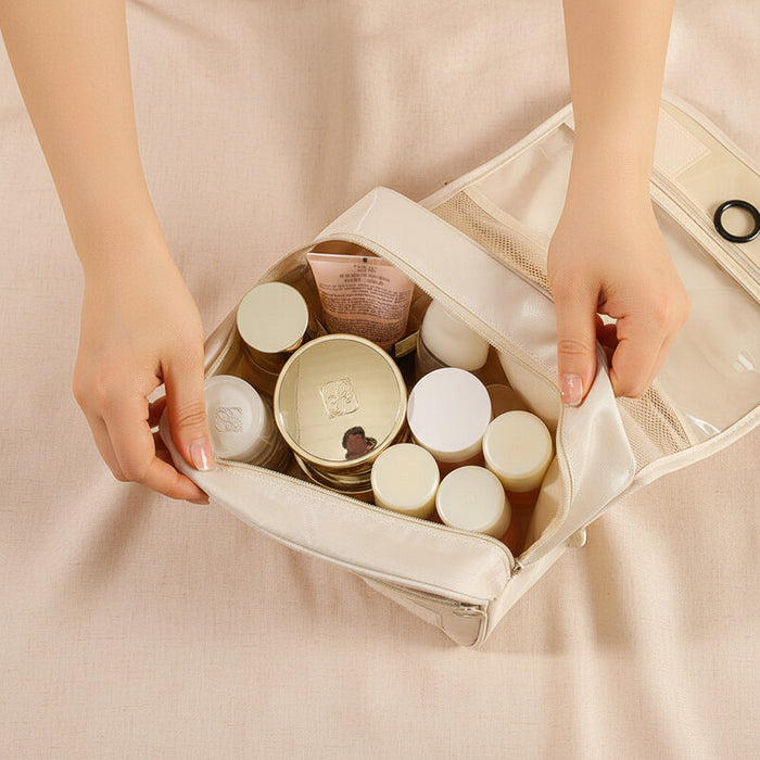 Hanging toiletry organizer with a spacious main compartment for face wash, skincare products and makeup remover