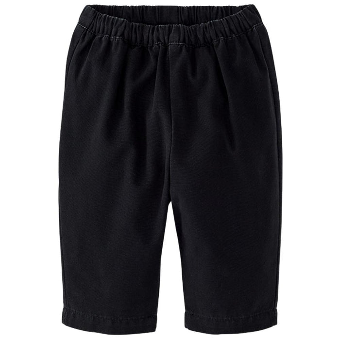Black elastic waist shorts with a textured fabric, photographed against a solid white background.