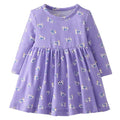 A long-sleeve baby dress in lavender purple, featuring an all-over print of small blue and white striped cats, shown against a plain white background.