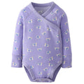 A baby long-sleeve wrap bodysuit in lavender purple, featuring an all-over print of small blue and white striped cats, shown against a plain white background.