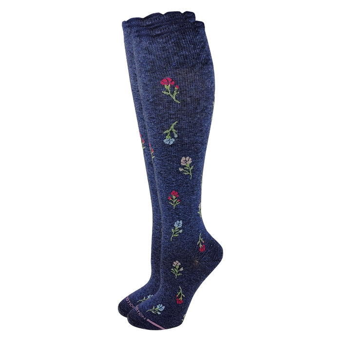 Pair of blue knee-high compression socks with floral embroidery on a white background