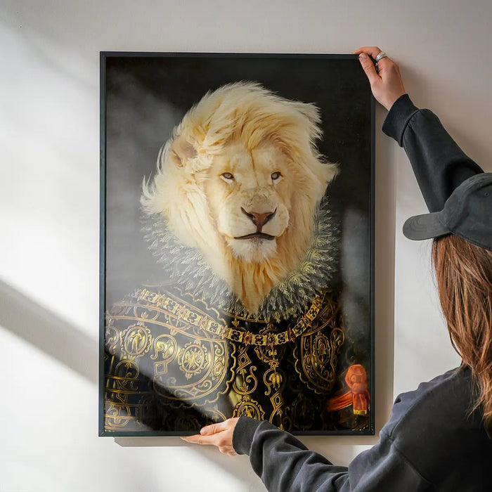 King Lion Portrait Print being hung on a wall in a black frame