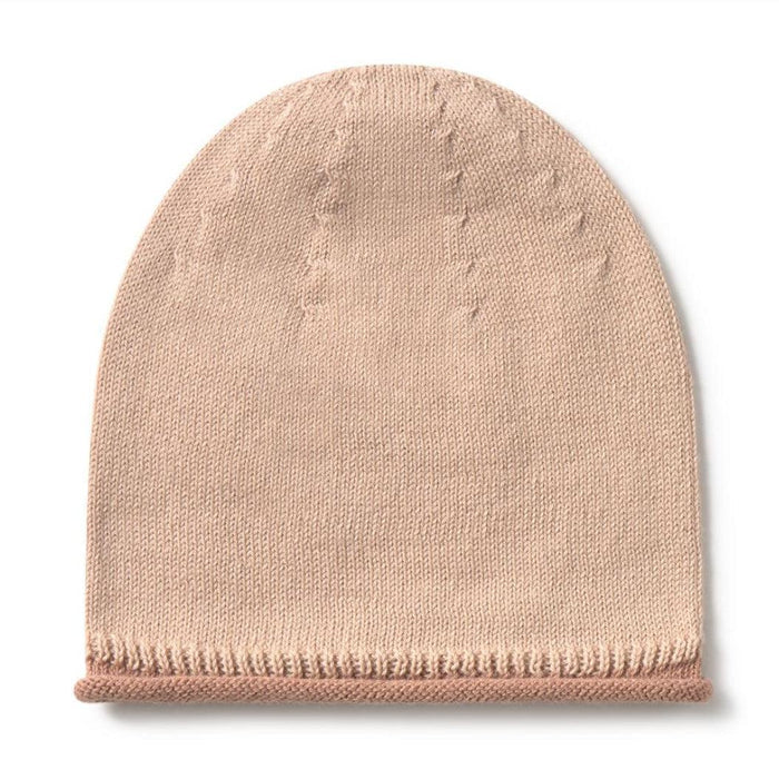 A light beige knit beanie hat with a ribbed cuff, shown flat against a white background.