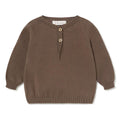 A brown ribbed knit baby sweater with three button details on the chest, displayed flat against a white background.
