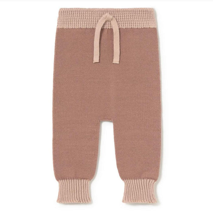A pair of knit baby pants in a dusty rose color with contrasting light pink ribbed waistband and cuffs, featuring a front split design and drawstring.