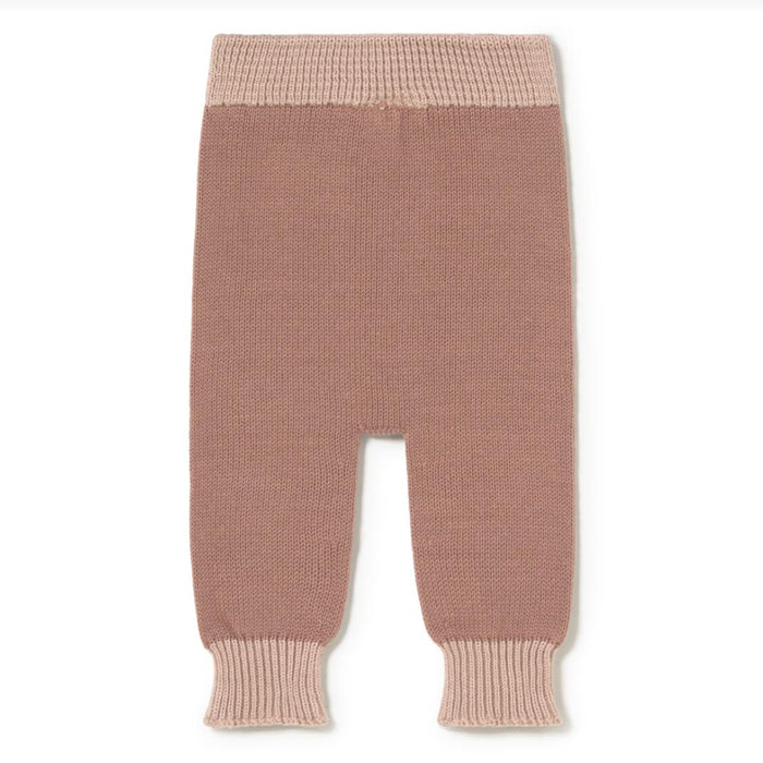 A pair of knit harem-style pants in a dusty rose pink color, featuring contrasting light pink ribbed cuffs and waistband, shown flat on a white background.