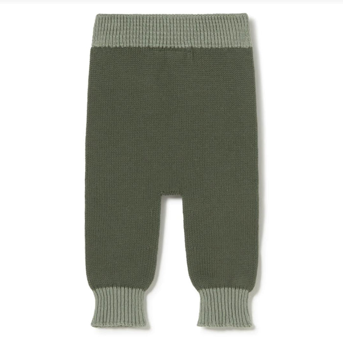 A pair of knit baby pants in a muted sage green color, featuring a wide ribbed waistband and matching ribbed ankle cuffs, shown flat on a white background.