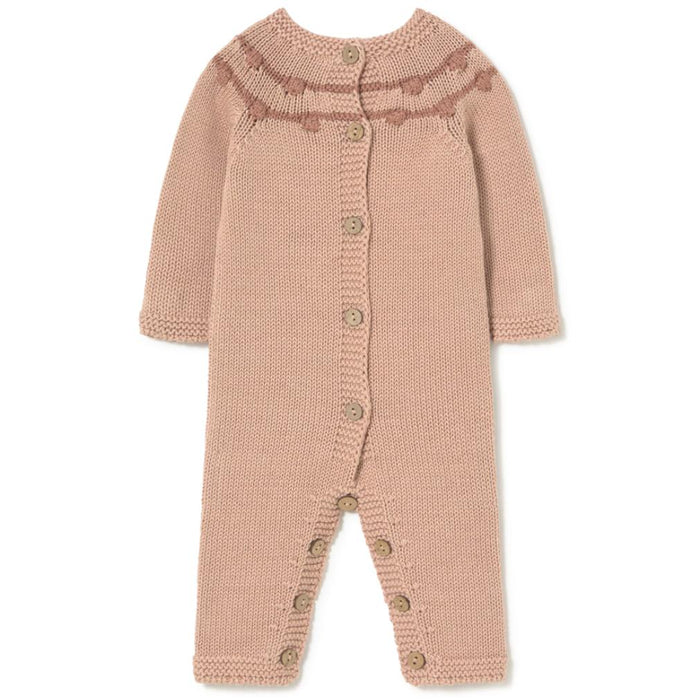 A light pink hand-knit baby jumpsuit with a button-down front, decorative knit collar, and snap closures on the legs, shown against a plain white background.