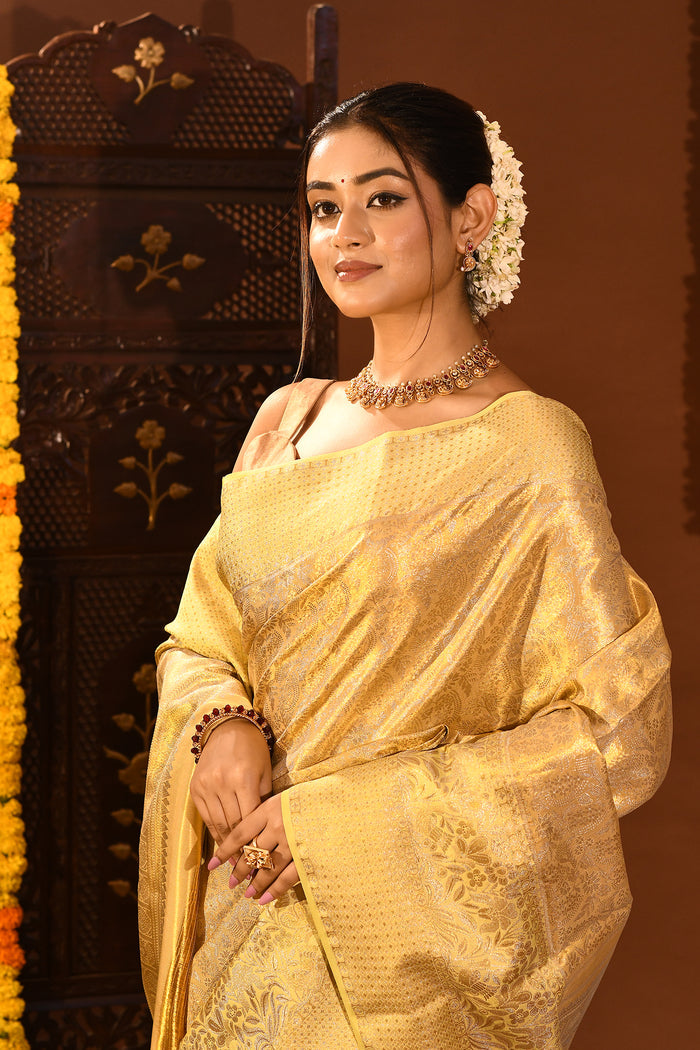 Luminous Gold With Floral Jaal And Ornate Border On Kanjivaram Tissue Silk Saree