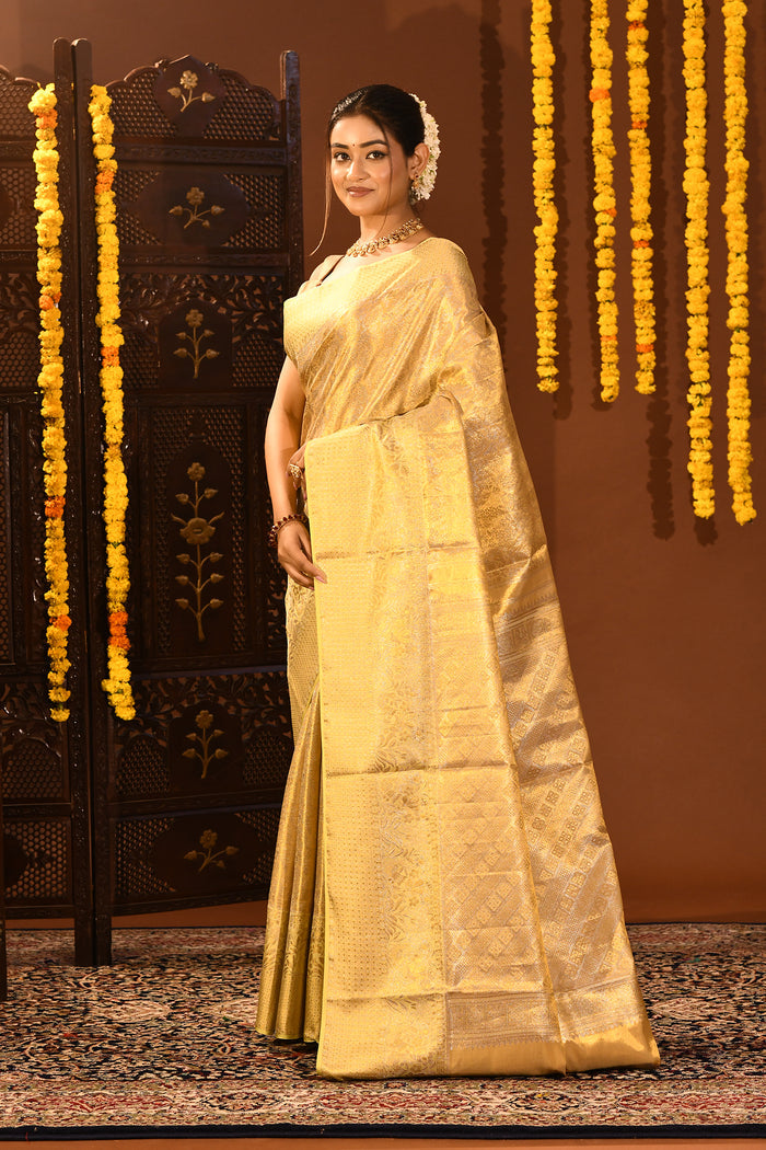 Luminous Gold With Floral Jaal And Ornate Border On Kanjivaram Tissue Silk Saree