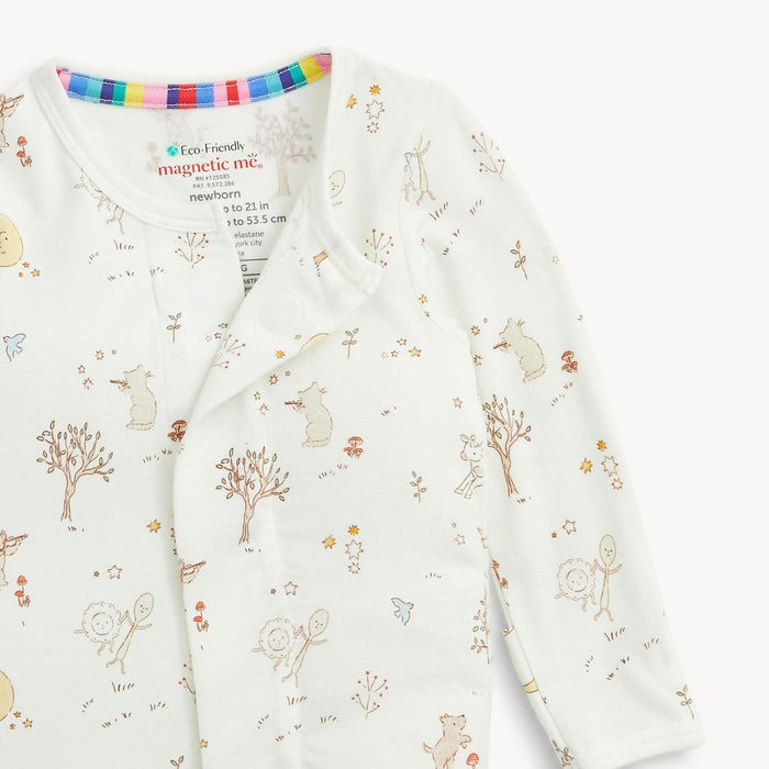 Baby onesie with animal and nature pattern on a white background