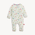 Baby romper with a colorful, all over print featuring cartoon fruits and vegetables