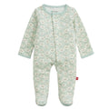 A baby footed sleeper in a pale mint green color with a repeating pattern of cartoon animals, shown against a plain white background.