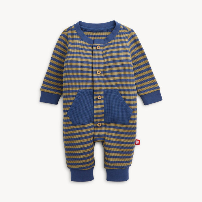 A baby long-sleeve romper with horizontal blue and mustard yellow stripes, featuring a blue waffle-knit collar, button closure, and front pockets, shown on a light gray background.