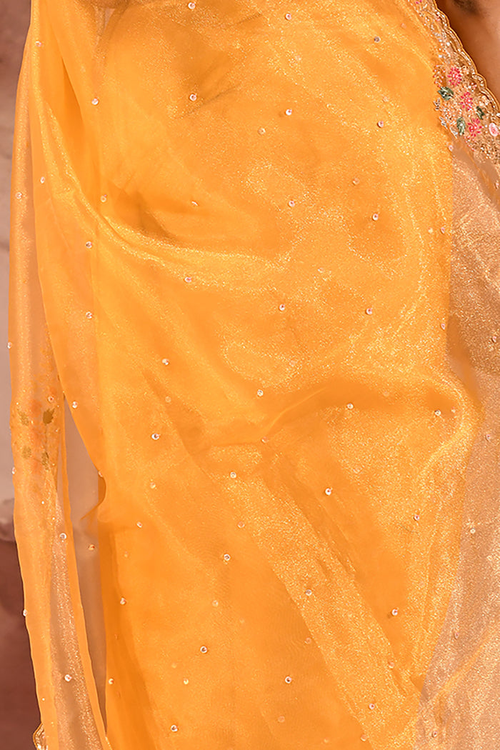 Marigold Yellow With Floral Stone Embellished Border Organza Saree
