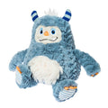 Plush toy resembling a gray monster with blue horns and orange accents on a white background