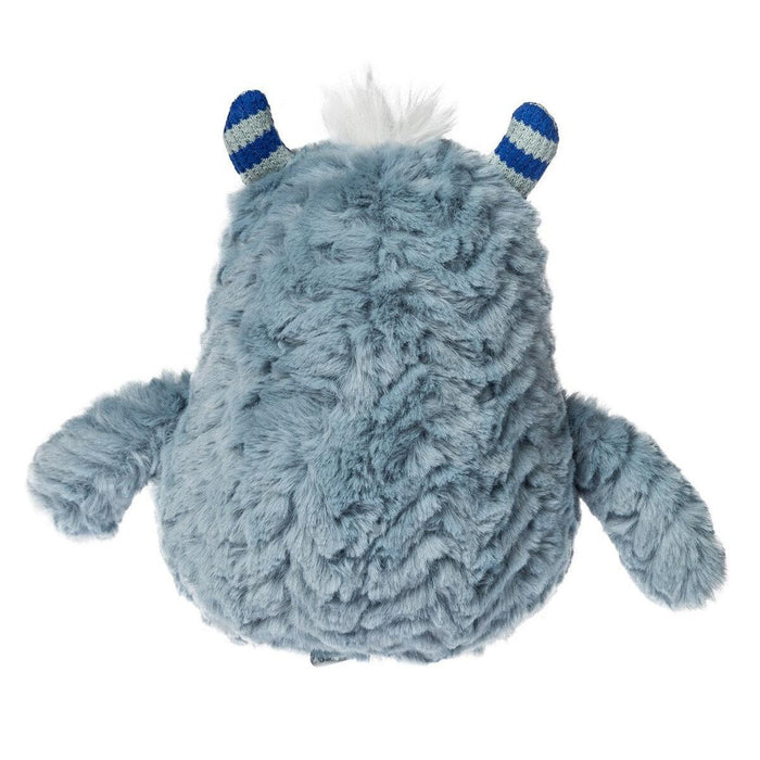 A light blue fuzzy monster plush toy shown from the back, featuring blue and white striped horns and a small white tuft of hair on a plain white background.