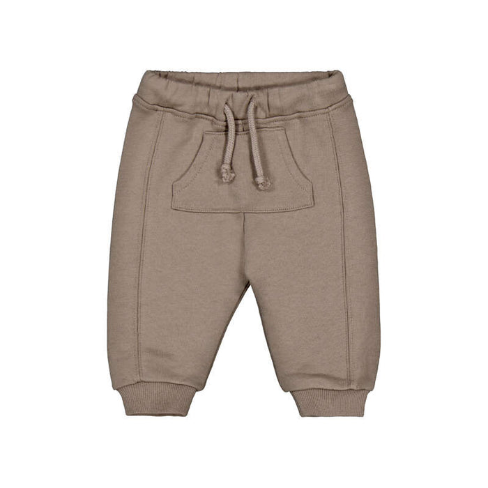 A pair of children's jogger sweatpants in a taupe-brown color, featuring an elastic waistband with a matching drawstring, side pockets, and ribbed ankle cuffs, shown against a plain white background.