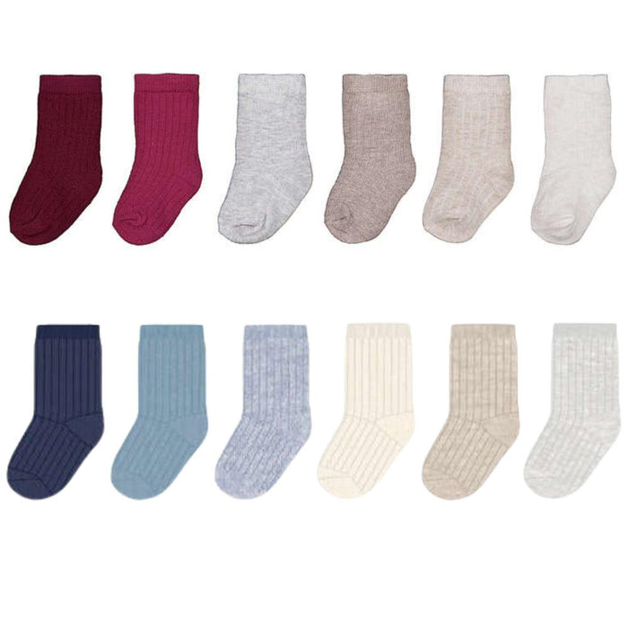Twelve pairs of ribbed ankle socks shown in two rows on a white background, featuring a variety of colors including burgundy, magenta, light gray, taupe, cream, navy, light blue, periwinkle, off-white, beige, and light gray.