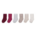 Six pairs of children's socks arranged in a row on a plain white background. The colors are dark burgundy, magenta, light heather gray, taupe, cream, and off-white.