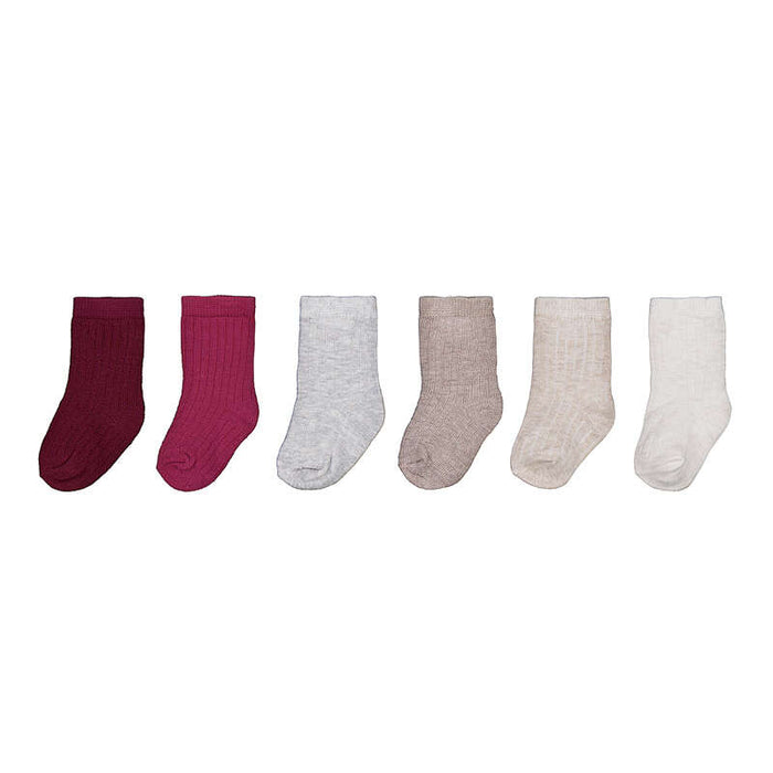 Six pairs of children's socks arranged in a row on a plain white background. The colors are dark burgundy, magenta, light heather gray, taupe, cream, and off-white.