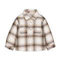 Plaid shirt with beige and brown pattern on a white background